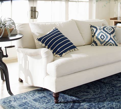 what do you think The rolled English-style arms are graceful, it looks deep enough to have a relaxing nap, and you know I'm a sucker for any kind of slipcover. . Pottery barn carlisle sofa